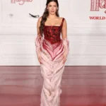 Ariana Madix wearing a red embellished gown at Wuthering Heights premiere