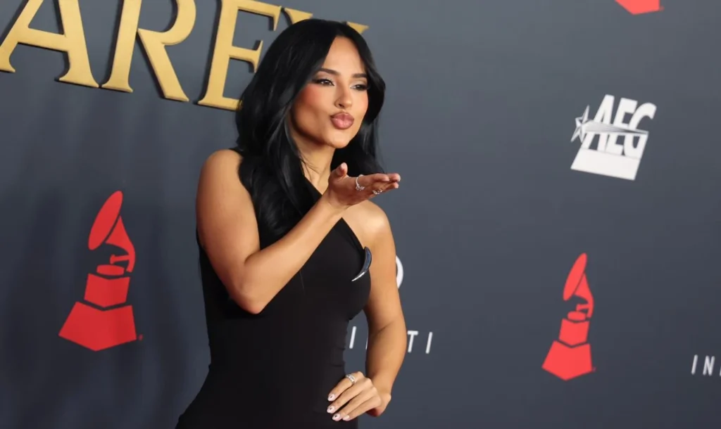 Becky G posing at MusiCares gala honoring Mariah Carey
