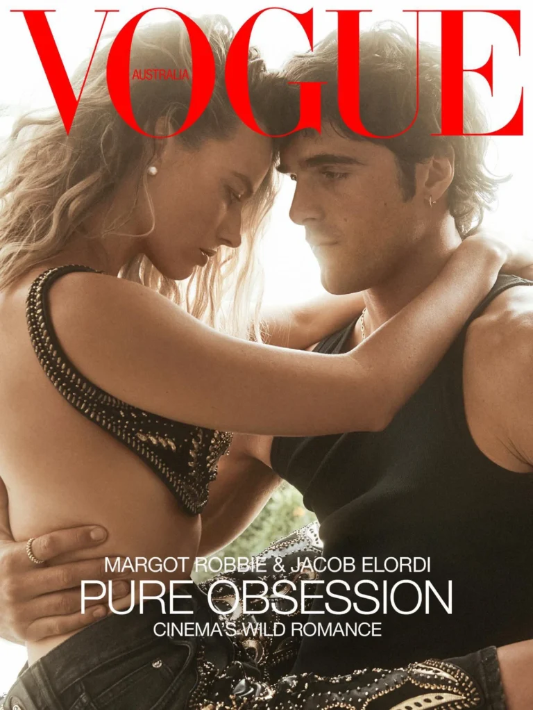 Margot Robbie wears a Versace bralette and shorts; Paspaley earrings. Jacob Elordi wears a Supreme x Hanes tank top; Versace jeans; Cartier earrings, necklace and ring.