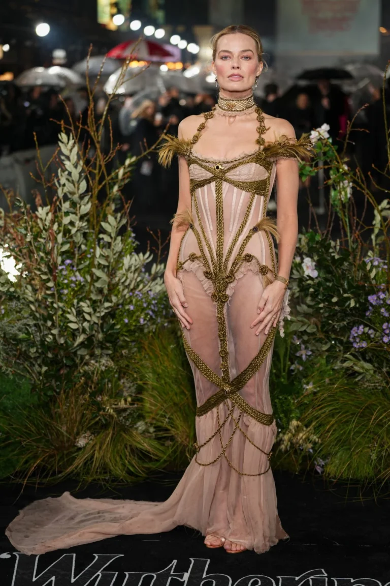 Margot Robbie wearing a sheer pink Dilara Findikoglu gown at Wuthering Heights UK premiere