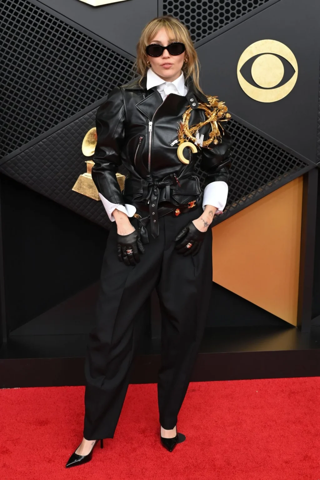 Miley Cyrus wearing a custom black Celine leather moto outfit at the 2026 Grammy Awards in Los Angeles
