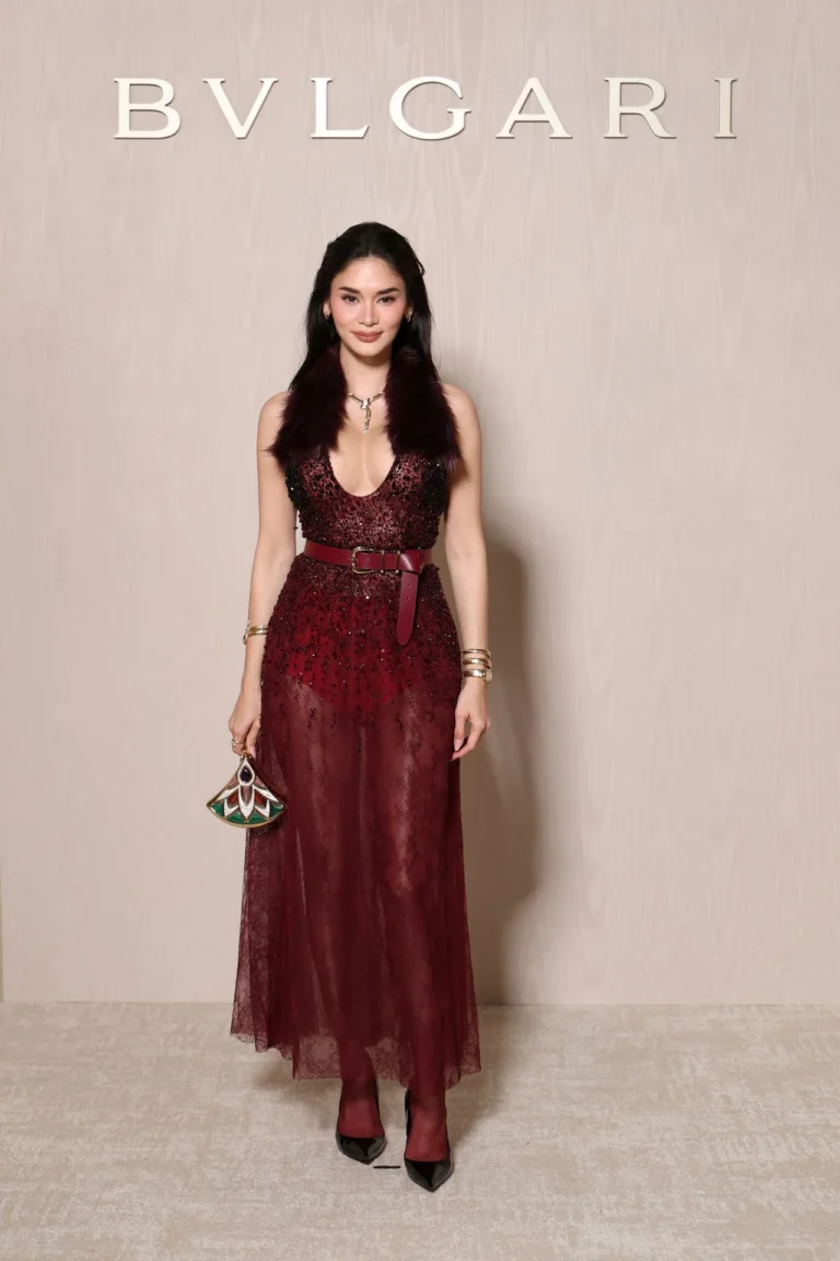 Pia Wurtzbach wearing a burgundy embellished gown at BVLGARI ICONS Minaudière celebration Paris 2026