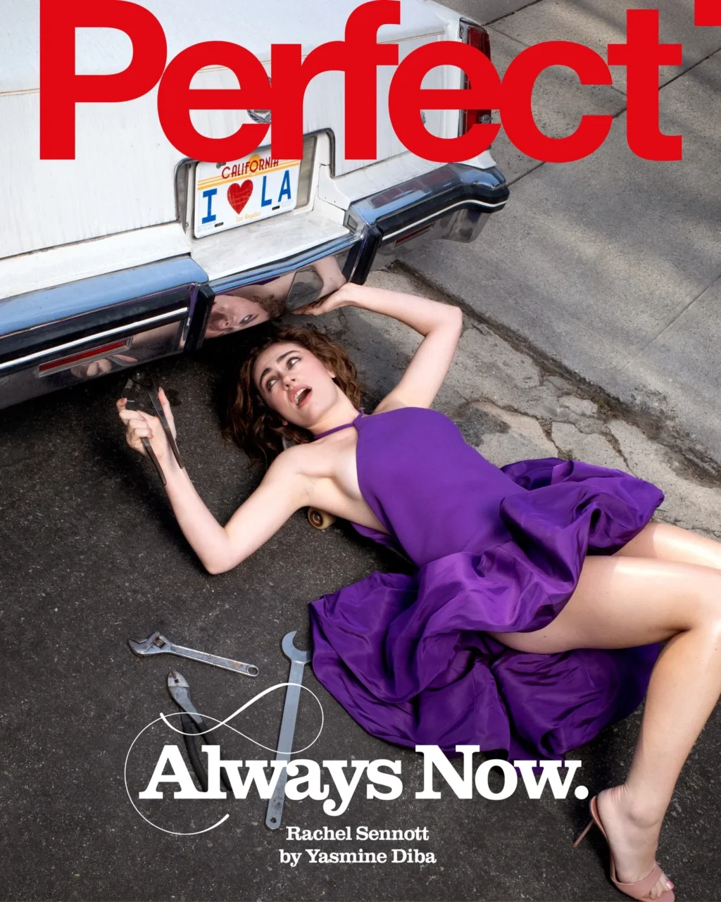 Rachel Sennott wearing a purple halter-neck mini dress under a classic white Cadillac for Perfect Magazine cover